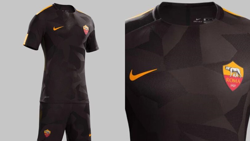 Marrone scuro e arancione acceso: la terza maglia della Roma