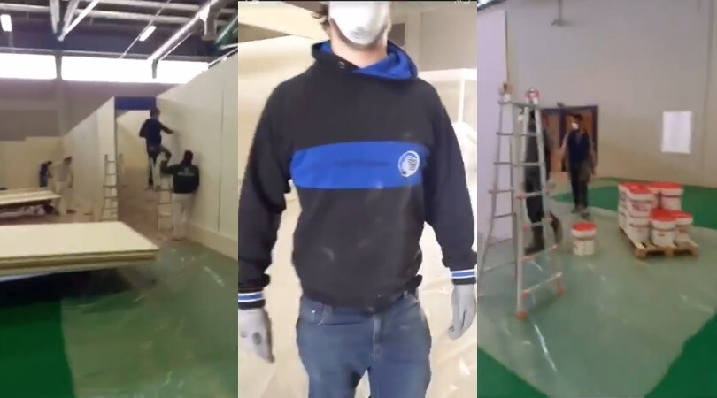 Gli ultrà imbianchini dell’Atalanta al lavoro nel nuovo ospedale da campo di Bergamo realizzato dagli alpini