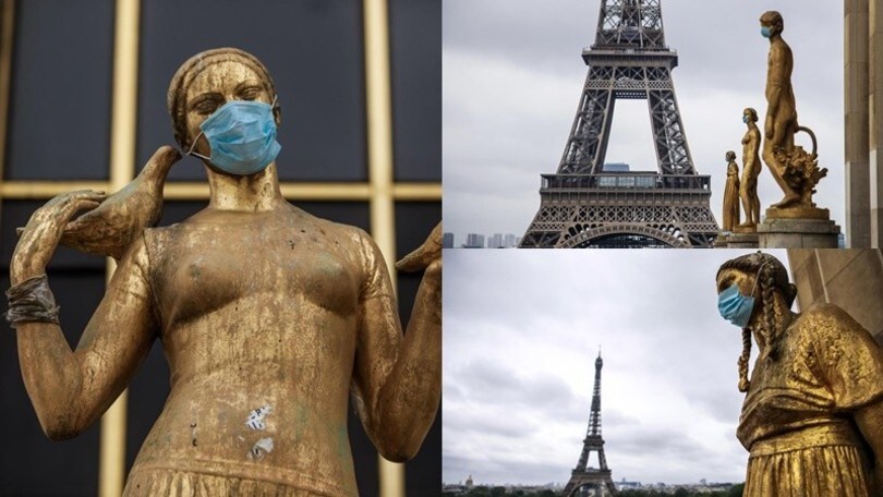 Coronavirus, indossano la mascherina anche le statue dorate del Trocadero