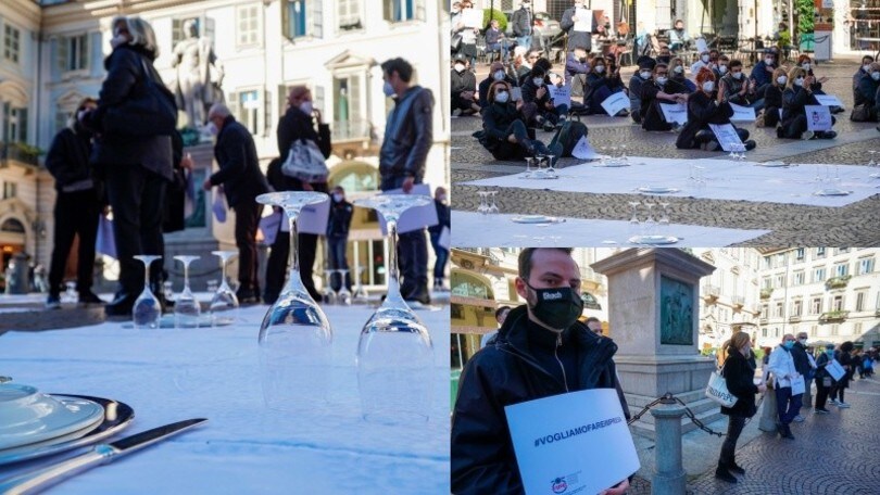 Coprifuoco a Torino, protesta dei ristoratori con piatti e bicchieri per terra