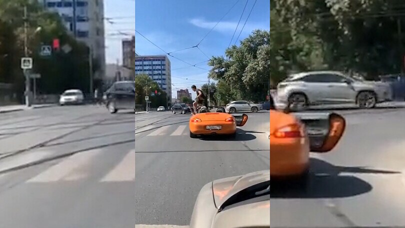 Pedone “pignolo” attraversa la strada salendo sopra un'auto