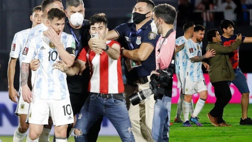 Tutti pazzi per Messi: tifosi del Paraguay in campo per un selfie