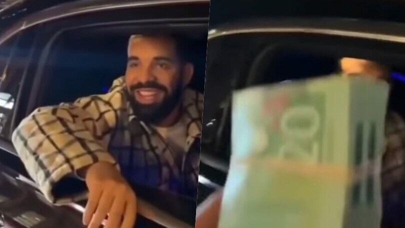 Drake come Babbo Natale: in auto, dona soldi ai passanti