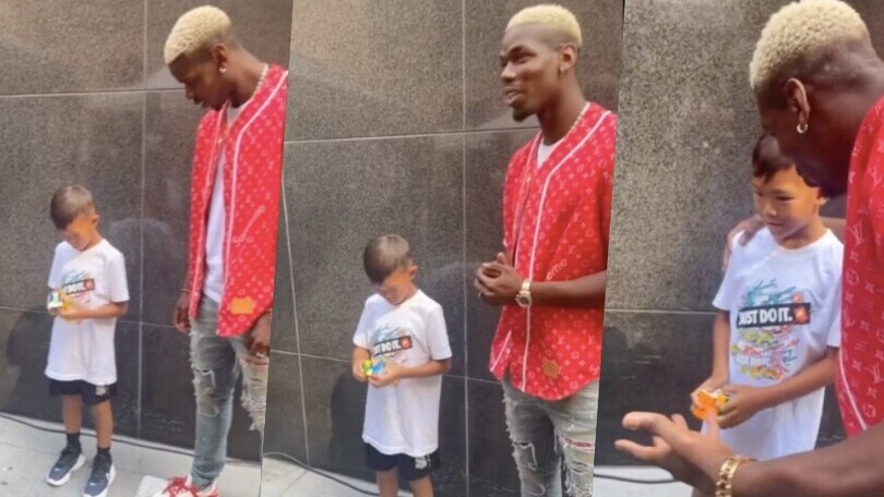 Pogba stupito da un bambino che risolve velocemente il cubo di Rubik