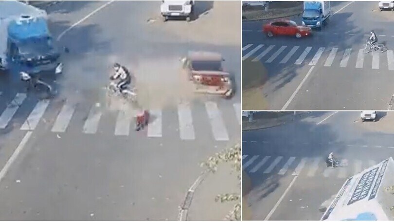 Che scontro tra auto e camion: e il ciclista in mezzo? Neanche un graffio