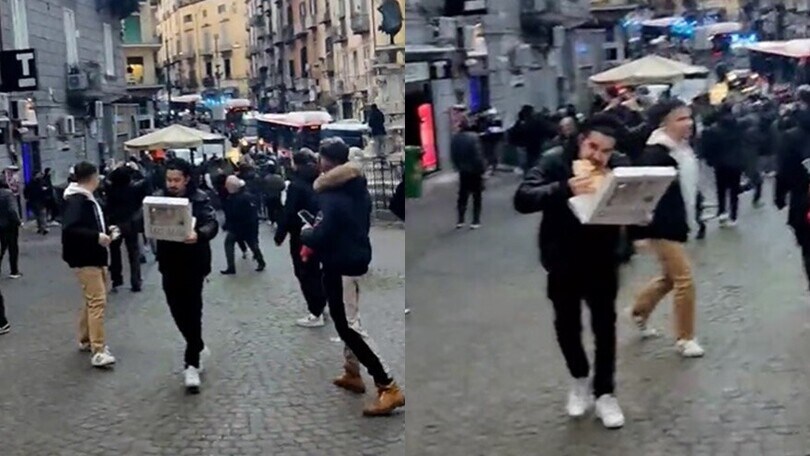 Incredibile a Napoli: mangia la pizza durante gli scontri coi tifosi dell'Eintracht