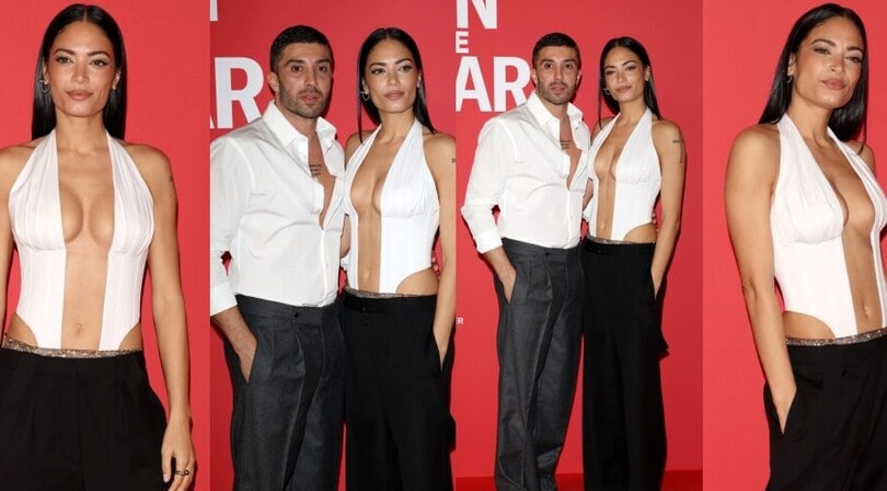 Elodie, trasparenze e scollature per la prima sfilata con Iannone