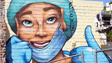 A Milano il murale simbolo della lotta al Coronavirus