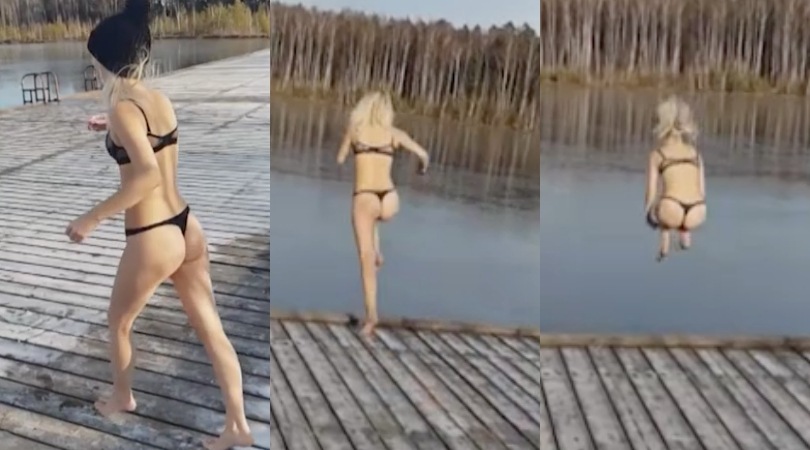 Sfida il lago ghiacciato in intimo: il tuffo provocante però è un disastro