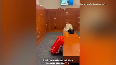 Flavia Pennetta si emoziona davanti all'armadietto dello US Open