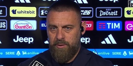 Lo Stadium lo applaude, De Rossi non se l'aspetta: la reazione in diretta tv