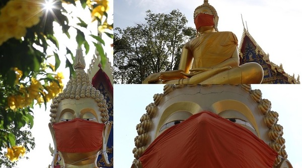 Coronavirus, a Bangkok Buddha con la mascherina è un monito per la popolazione