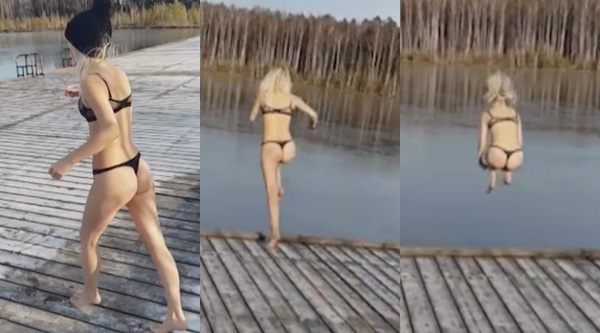 Sfida il lago ghiacciato in intimo: il tuffo provocante però è un disastro