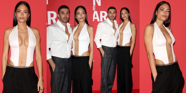 Elodie, trasparenze e scollature per la prima sfilata con Iannone